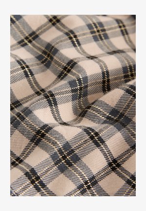 Katoenen stof met een ruitpatroon in lichtbeige, marineblauw en metallic goudaccenten. Zachte textuur met zichtbaar weefsel.