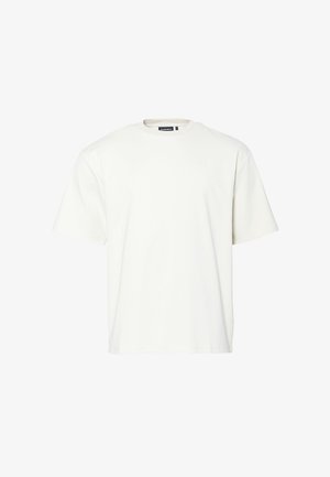 Koszulka z krótkim rękawem w kolorze off-white, wykonana z miękkiej bawełny. Posiada okrągły dekolt i luźny krój, z minimalnymi przeszyciami w okolicy dekoltu.