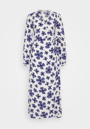 Maxi dress in lightweight fabric, featuring a white background with purple floral pattern, v-neck, long sleeves, and a tie waist detail.