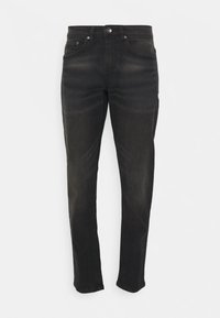 Jeans neri slim-fit con cinque tasche, chiusura con bottone e leggere sfumature sulle cosce e sulle ginocchia.