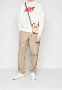 Nike Sportswear Mikina s kapucí - off-white