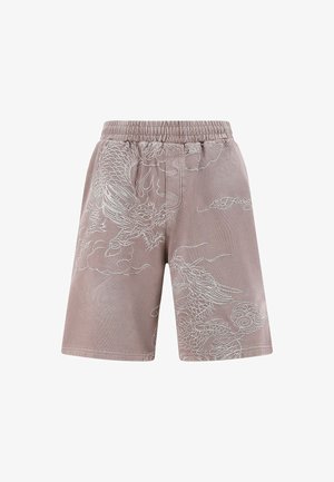 Lysebrune shorts med elastisk talje, der har hvid dragemanchet og skymønstre, lavet af et blødt stof med en glat tekstur.
