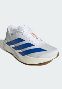 White athletic shoe with blue stripes, textured surface, and a cushioned sole. Features a padded collar and a prominent "ADIZERO" label.