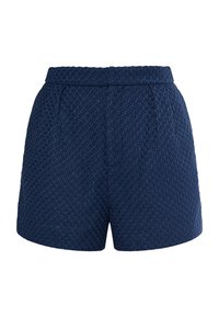 Shorts tessuti blu navy con un motivo a diamante testurizzato, dotati di una vita piatta e tasche laterali. Forma pulita e sartoriale.