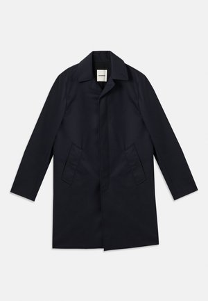 Navy coat with a notched collar, single-breasted design, two side pockets, and smooth fabric texture. Minimalist style, no visible hardware.
