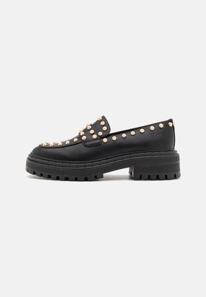 Platåpumps - black
