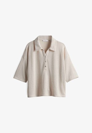 Beige Poloshirt mit kurzen Ärmeln aus textured Stoff, mit Kragen und drei Knöpfen an der Vorderseite. Bequeme Passform und einfaches Design.