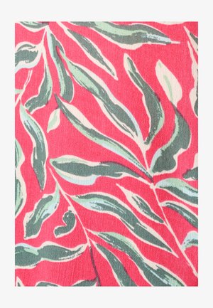 Motif de feuilles allongées vertes et blanches sur un fond de tissu texturé rose vif.