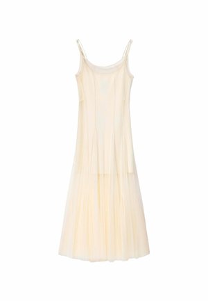Robe sans manches couleur crème avec fines bretelles et une jupe fluide plissée s'étendant jusqu'au sol.