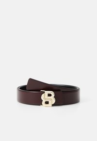 Burgundy leather belt with a smooth texture, featuring a gold-tone buckle with a stylized 'B' design.