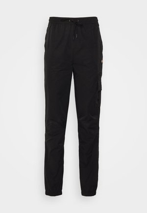 Ellesse APERIO - Reisitaskuhousut - black