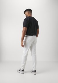 Jack's Sportswear SUPERFLEX PANTS - Chino hlače - white