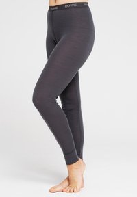 Grå leggings lavet af blødt materiale, med en bred elastisk talje med mærkenavnet "DOVRE" trykt i sort og et tætsiddende design.