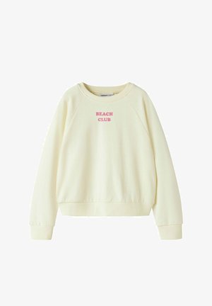 Kremowa bluza z długim rękawem i okrągłym dekoltem, z prążkowanymi mankietami i dołem, z różowym napisem "BEACH CLUB" na środku klatki piersiowej.