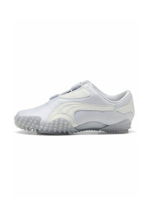 White athletic shoe with textured sole spikes, smooth upper, and mesh side panels, designed for grip and lightweight performance.