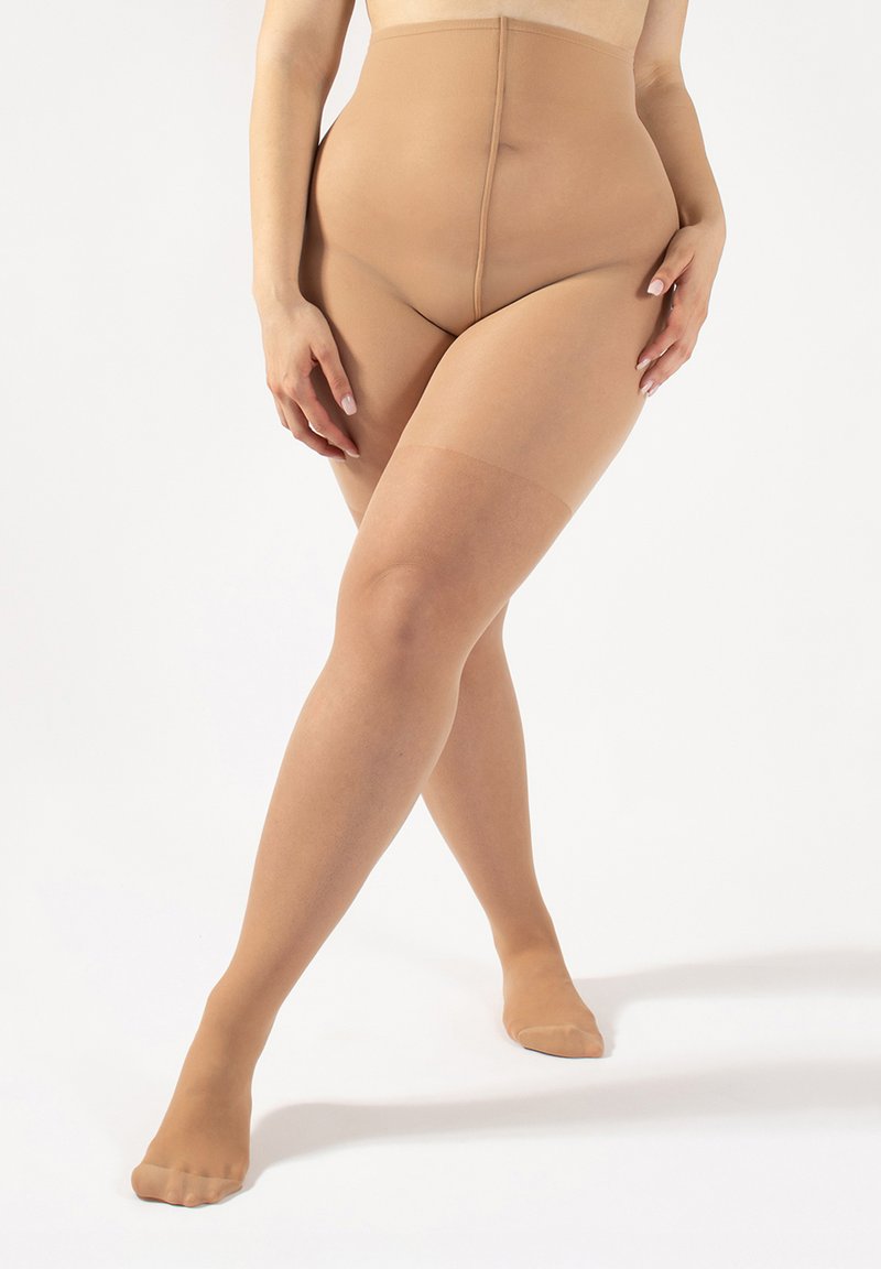 Pantys beige de tiro alto con una textura suave, que presentan una pierna opaca y una banda superior suave y sin costuras para mayor comodidad y soporte.