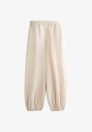 Pantalon beige à coupe ample avec fines rayures verticales, taille élastique et poignets élastiques aux chevilles.