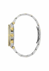 Silver- och guldfärgad klocka med en texturerad rektangulär klockkapsel, tre guldfärgade knappar och ett metallarmband med växelvis finish.