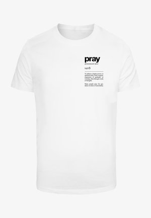 White cotton t-shirt with a printed definition of "pray" on the front in black text. Features a simple crew neck design.