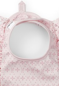 Rosa barntröja med rundad halsringning, volangärmar och blommönster med små cirkulära detaljer.