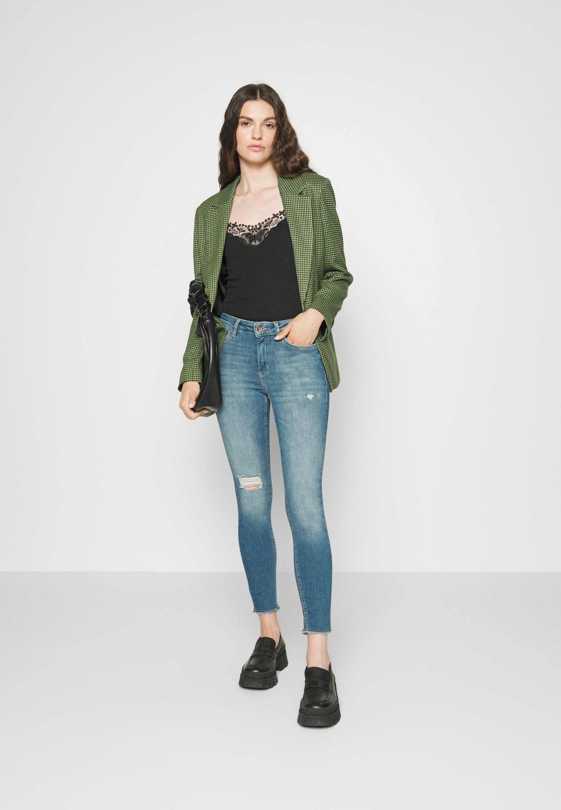 zara green jeans outfit