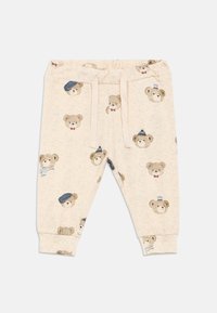 Μπεζ παντελονάκια για νήπια με ρυθμιζόμενη μέση, διακοσμημένα με πρόσωπα αρκουδάκων που φορούν καπέλα, γυαλιά, παπιγιόν και κασκόλ.