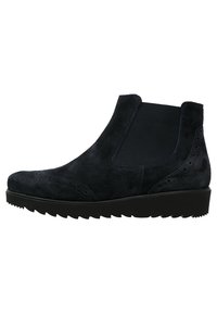 Botín de ante negro estilo Chelsea con paneles laterales elásticos, detalles de brogue y suela gruesa con relieve.