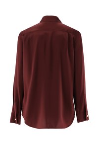 Long-sleeve maroon shirt with buttoned cuffs, spread collar, and curved hem shown from the back on a white background.