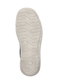 Sole of a shoe, featuring a white rubber material with a textured, patterned surface and a fleur-de-lis logo in the center.