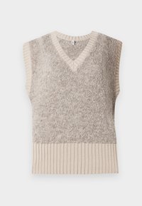 Ermeløs, V-hals genser i myk beige strikk, med en teksturert kropp og en kontrasterende ribbestrikket kant i en lysere beige nyanse.