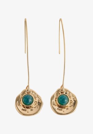 Boucles d’oreilles pendantes couleur or avec des disques ronds irréguliers et des pierres polies vertes centrales, suspendues à des crochets fins et courbés.