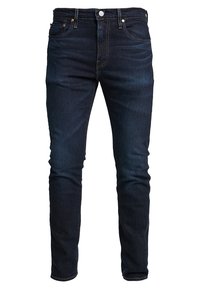 Jeans slim-fit blu scuro con cinque tasche, cuciture a contrasto e chiusura frontale con bottone e zip.
