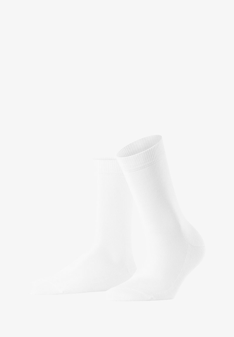 White cotton socks with ribbed cuffs and smooth texture, designed to cover the ankle and provide comfort.