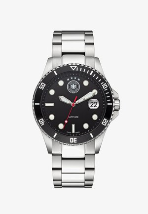 Edelstahlarmbanduhr mit schwarzem Zifferblatt, leuchtenden Indizes und Datumsanzeige bei 3 Uhr. Rote Sekundenzeiger, einseitig drehbare Lünette und Saphirglas.