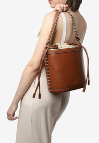 Miriade Borsa a mano - cuoio