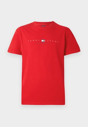Röd bomull t-shirt med rund hals, korta ärmar och en grafisk logotyp med "TOMMY JEANS" och "NEW YORK CITY" tryckt i vitt.
