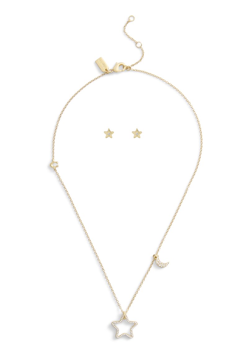 Set di gioielli in tonalità oro composto da un pendente a forma di stella e un charm a forma di luna crescente con accenti di pietre trasparenti; include orecchini a stella abbinati.