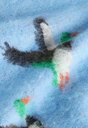 Soft blue wool fabric featuring colorful bird patterns in green, black, and white with hints of orange. Fuzzy texture, lightweight design.