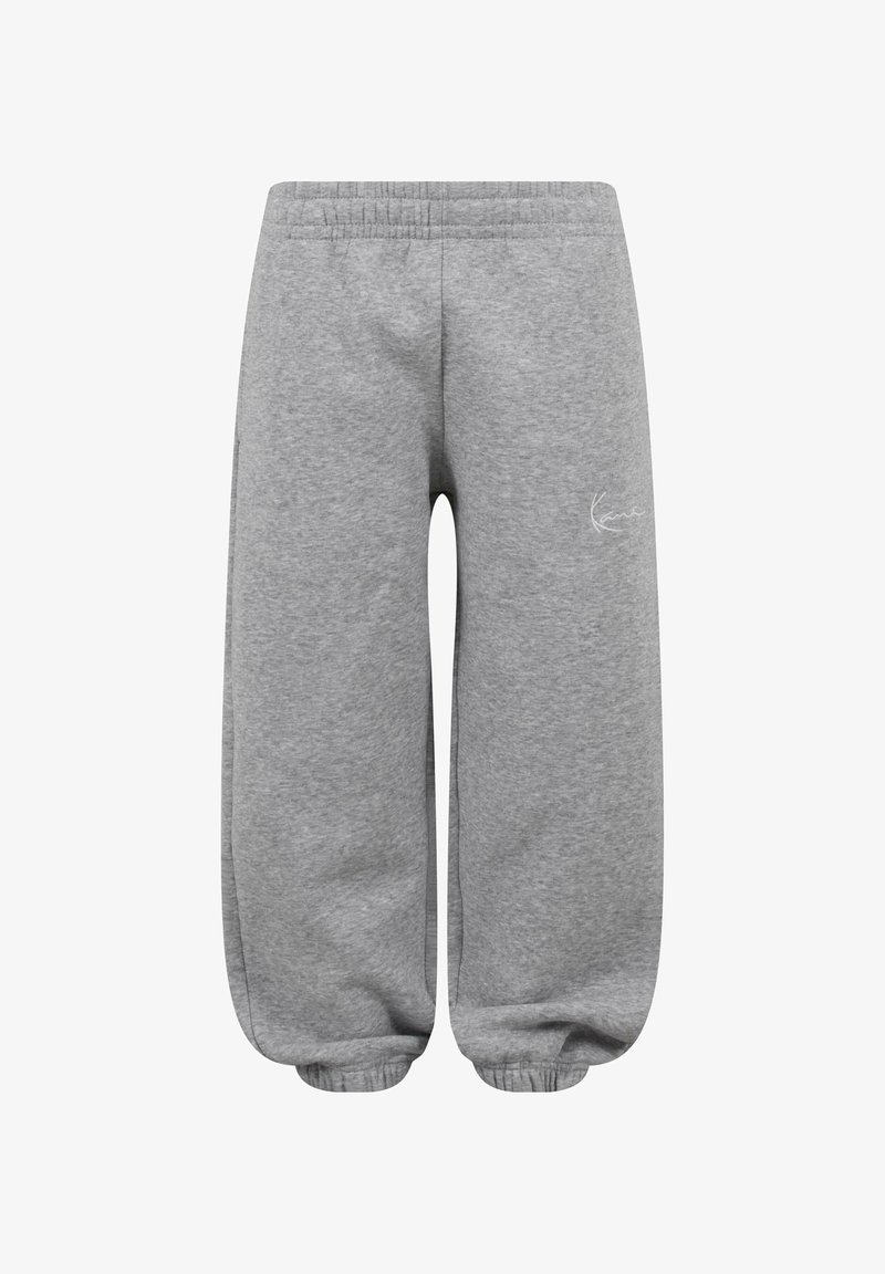 Pelēkie kokvilnas treniņbikses ar elastīgu jostasvietu un piedurknēm, kurām kreisajā kājā ir neliela balta logo. Mīksta tekstūra, brīvs piegriezums.