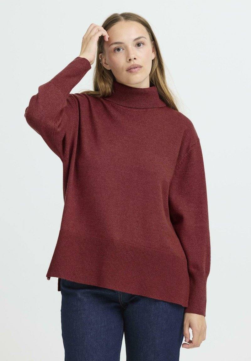 Burgundy színű pulóver magas gallérral, hosszú ujjakkal és bordázott aljjal; puha kötött anyagból készült; laza fit, enyhén oversize design.