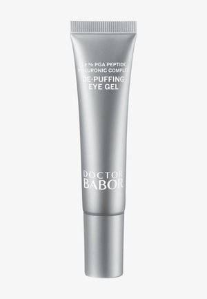 Zilveren kunststof tube met een schroefdop, gelabeld "Doctor Babor De-Puffing Eye Gel." Heeft witte tekst en een gladde metallic afwerking.
