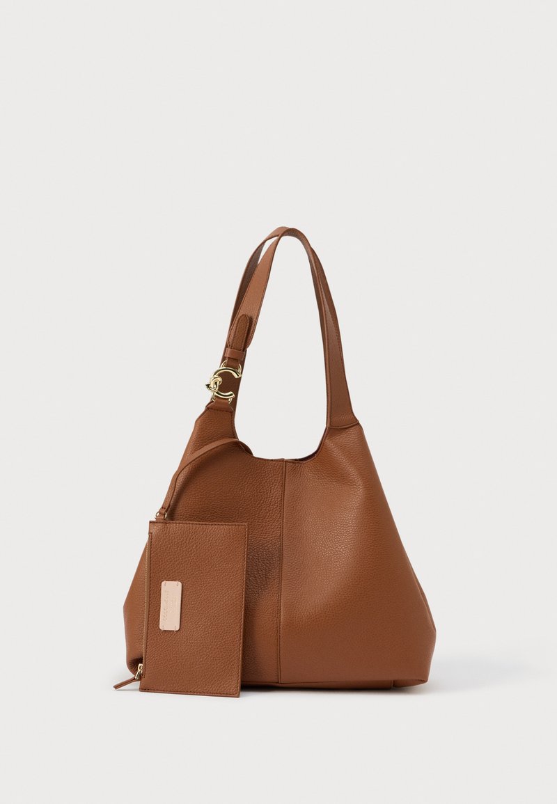 Brown textured leather shoulder bag with a top handle and attached matching zippered pouch with a beige label on front.