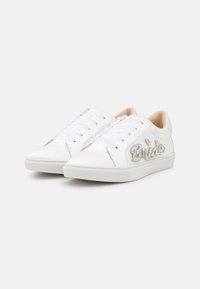 White leather sneakers with a smooth texture, featuring a raised "Bride" embellishment in rhinestones and a classic lace-up design.