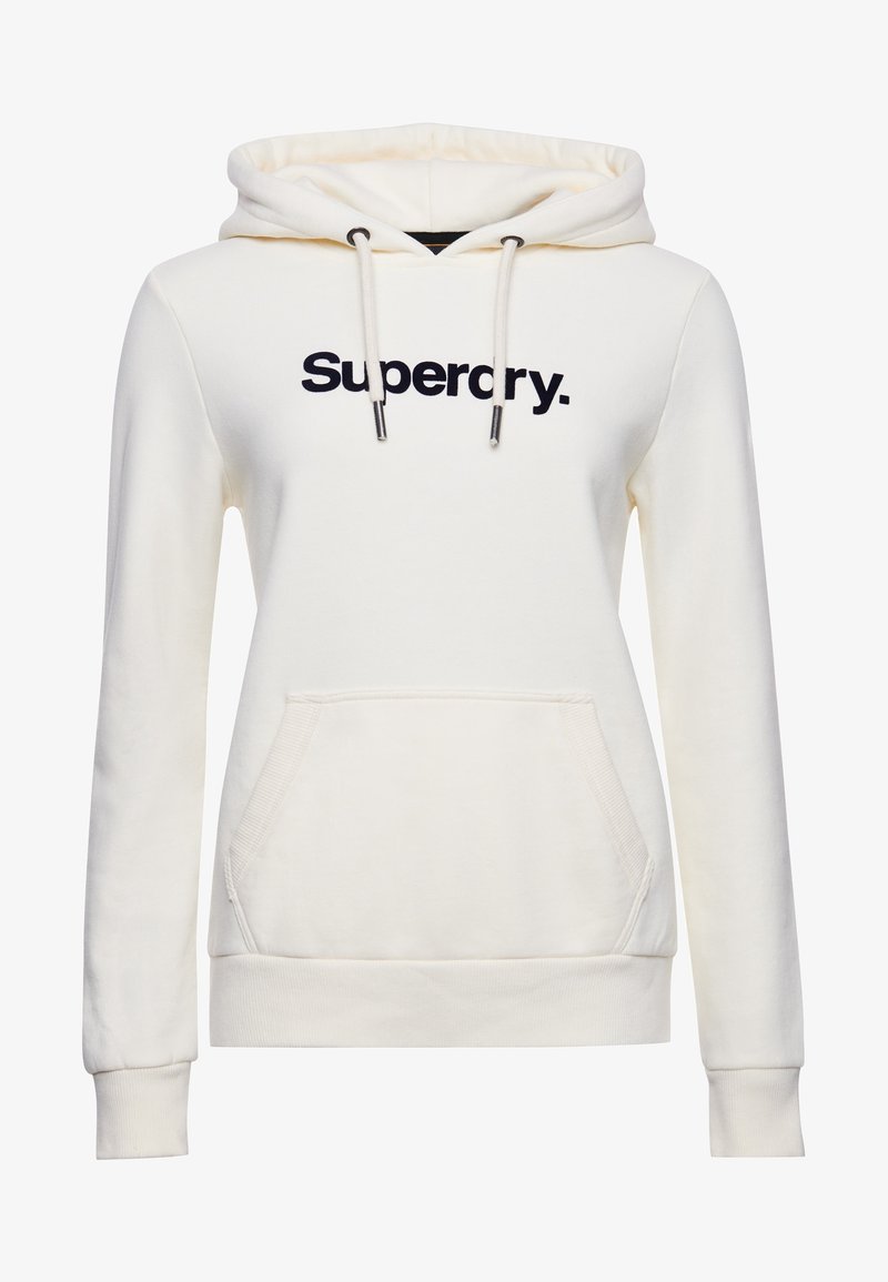 Crèmekleurige hoodie met een buidelzak, verstelbare capuchon met trekkoord en het "Superdry"-logo in marineblauw op de borst. Zacht katoenen materiaal.