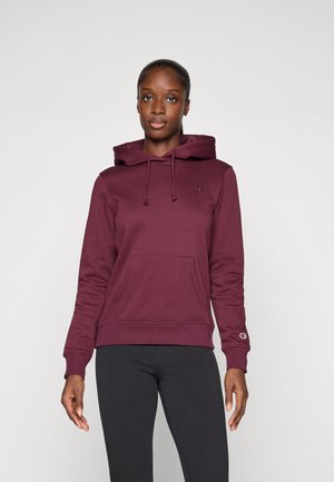 Felpa bordeaux realizzata in tessuto morbido, con cappuccio regolabile con coulisse, tasca a marsupio e logo in evidenza sul petto e sulla manica.