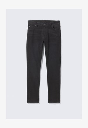 Sorte denimjeans med en slim fit, som har frontlommer, knappestolpe og diskrete sømdetaljer langs sidesømmene.