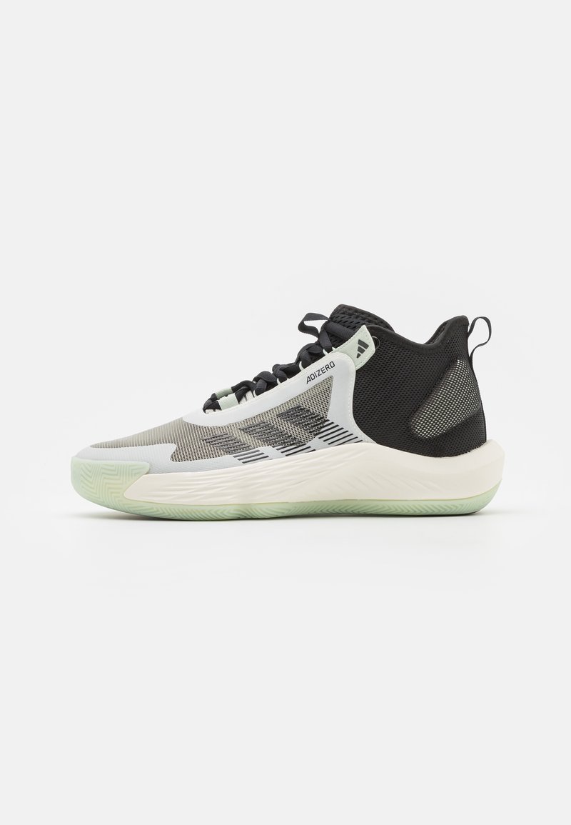 Low-top athletic sneaker with white sole, black heel, gray mesh upper, and black laces, labeled "Adizero" on side.