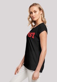F4NT4STIC DISNEY HIGH SCHOOL MUSICAL EAST - Camiseta estampada - black