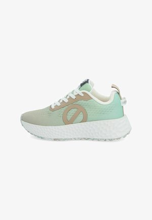 Light green and beige athletic shoe with a textured upper, reinforced toe, white laces, and a thick, cushioned sole with a pattern.