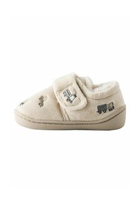 Chausson pour enfant en velours beige doux avec bande velcro, orné de petites voitures et camions brodés, et une semelle rembourrée.